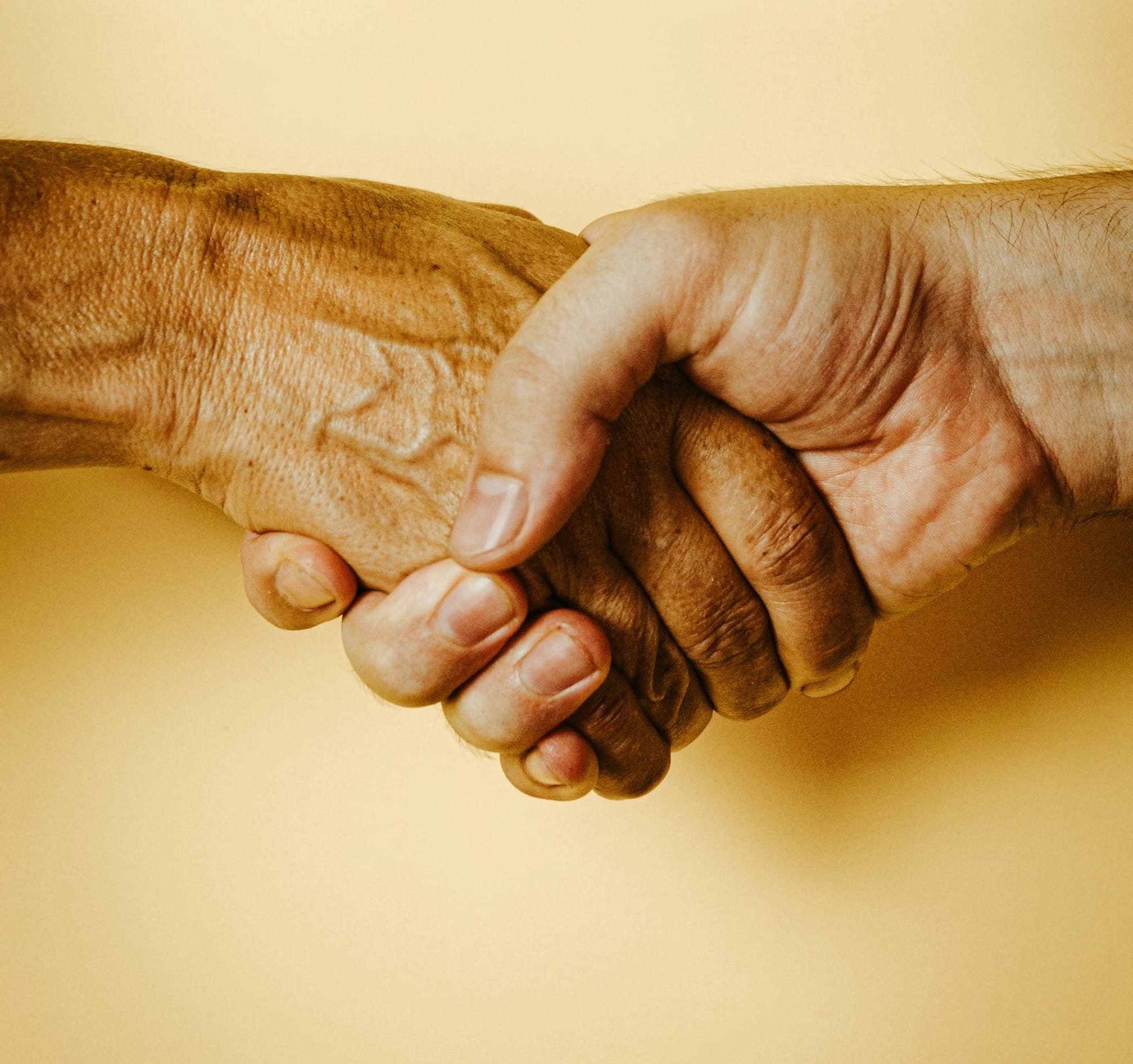 person holding babys hand